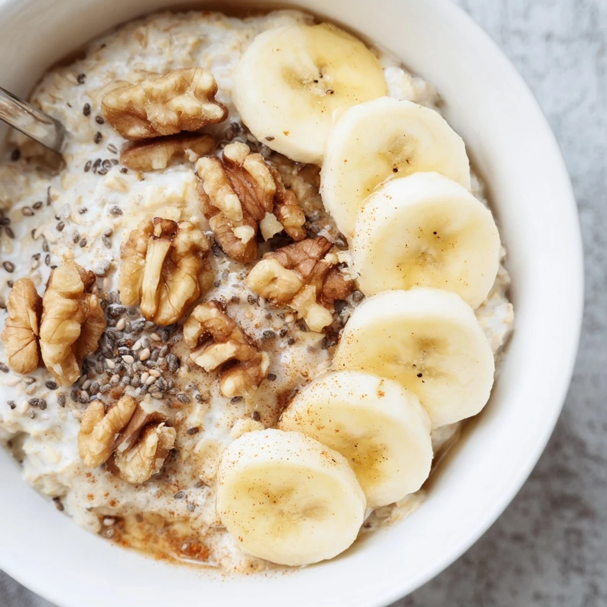 Enjoy this easy, two-minute Microwave Banana Oats breakfast, with textures of oats and sliced banana.