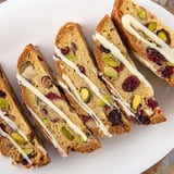 Overhead shot of freshly-baked white chocolate cranberry pistachio biscotti, ready for dipping into coffee.