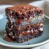 Indulgent brownies packed with bittersweet, milk, and semi-sweet chocolate, enhanced by tangy sourdough discard.  