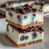 No-bake lemon blueberry cheesecake bars, a refreshing dessert with cookie crust.