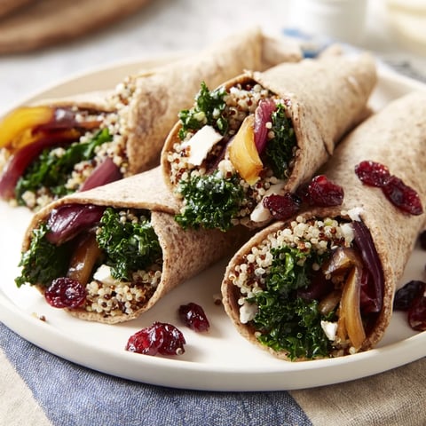 Golden-brown Roasted Brussels Sprouts & Cranberry Grain Wrap, the perfect vegetarian lunch with satisfying textures.
