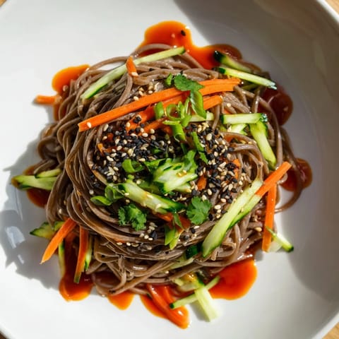 These Chilled Noodle Lunch Cups showcase glistening noodles and colorful veggies, a quick, fresh meal idea.