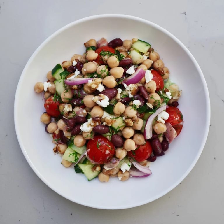Close-up of a refreshing Dense Bean Salad, featuring hearty beans and the tart cherry vinaigrette.