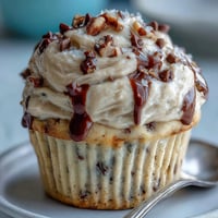 Creamy Greek yogurt cookie dough with mini chocolate chips, a protein-packed no-bake dessert in a white bowl.